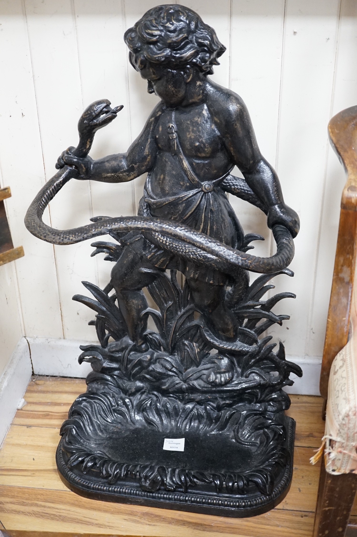 A Victorian style black painted cast iron infant Hercules stick stand in the Coalbrookdale style, height 82cm *Please note the sale commences at 9am.